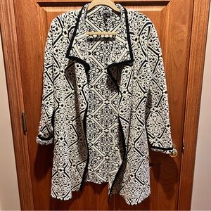 Black and White Patterned Long sweater with gold threads running through it